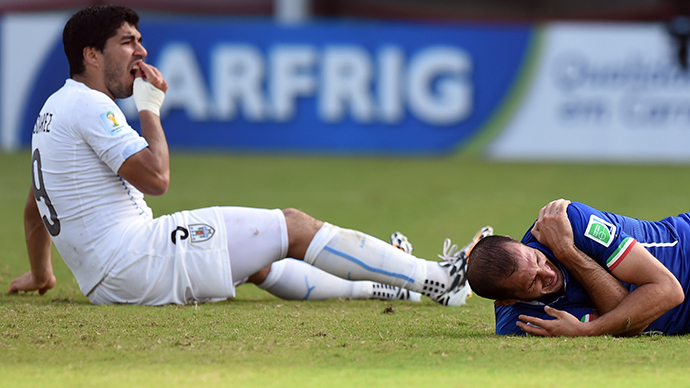 Uruguayan striker Luis Suarez takes a bite out of the competition, social media erupts