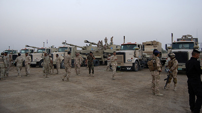 Iraqi security forces prepare during an intensive security deployment on the outskirts of the city of Samarra, June 24, 2014. (Reuters)