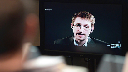 US National Security Agency (NSA) whistleblower Edward Snowden speaks to European officials via videoconference. (AFP Photo / Frederick Florin)