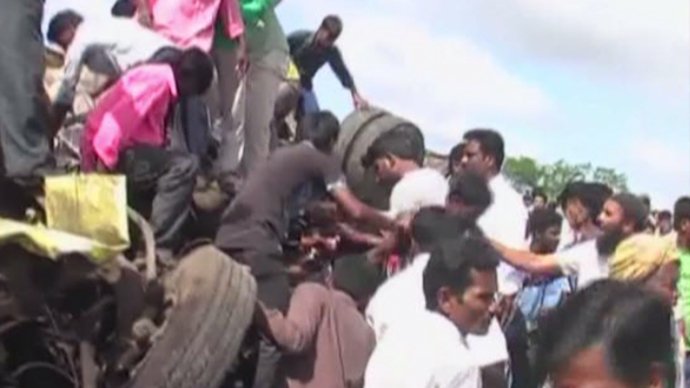 At least 20 killed in school bus collision in India