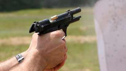 Beretta M9 during firing with cartridge casing being ejected (Photo from Wikipedia.org)