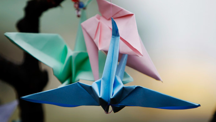 New origami-style robot can assemble itself, walk