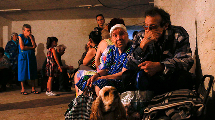 Underground life: E.Ukraine civilians pushed to basements by constant shelling (VIDEO)