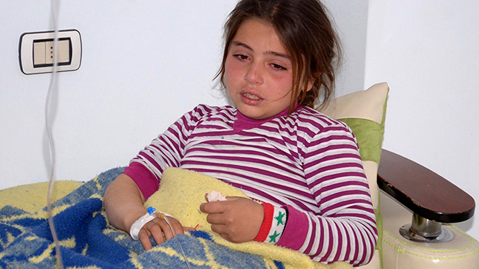 ARCHIVE PHOTO: A girl, injured in what the government said was a chemical weapons attack, is treated at a hospital in the Syrian city of Aleppo March 19, 2013 (Reuters / George Ourfalian)
