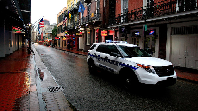 Coroner says man fatally shot himself in the chest while handcuffed behind his back