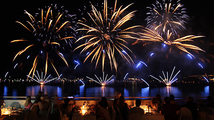 Fireworks light the sky over the Croisette during the Pyrotechnic Art Festival in Cannes, southeastern France, on August 24, 2014 (AFP Photo / Jean Christophe Magnenet)