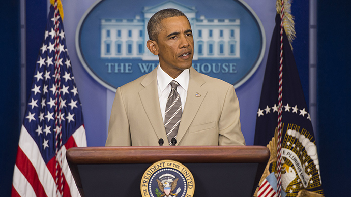 Obama threatens Russia with new sanctions over Ukraine