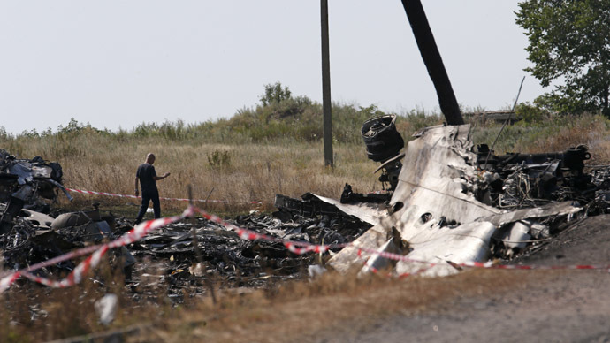 MH17 broke up in mid-air due to external damage - Dutch preliminary report