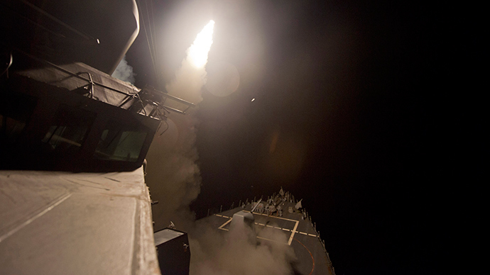 A Tomahawk cruise missile is launched against ISIL targets from the US Navy guided-missile destroyer USS Arleigh Burke, in the Red Sea September 23, 2014 (Reuters / US Navy)