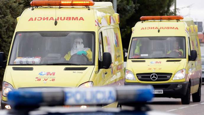 Two ambulances arrive at Madrid's Carlos III Hospital.(Reuters / Juan Medina)