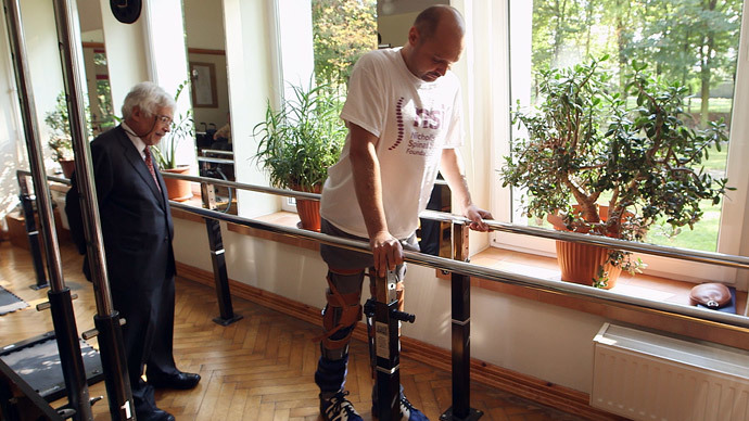 Paralyzed man walks again thanks to UK-funded tech