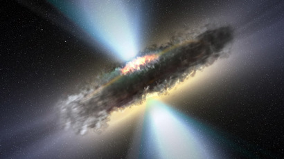 This illustration shows the thick dust torus that astronomers believe surrounds supermassive black holes and their accretion discs. (ESA / V. Beckmann (NASA-GSFC)