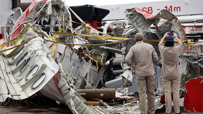 AirAsia captain left seat to fix computer system before jet lost control – reports