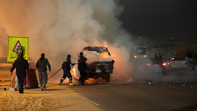 At least 19 killed in stampede as police clash with football fans in Cairo