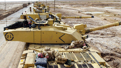 British soldiers of the Royal Scots Dragoon Guards, Armoured Regiment, take a break.(Reuters / STR)