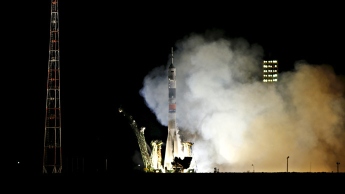 Russia-US crew dock at ISS for near year-long mission