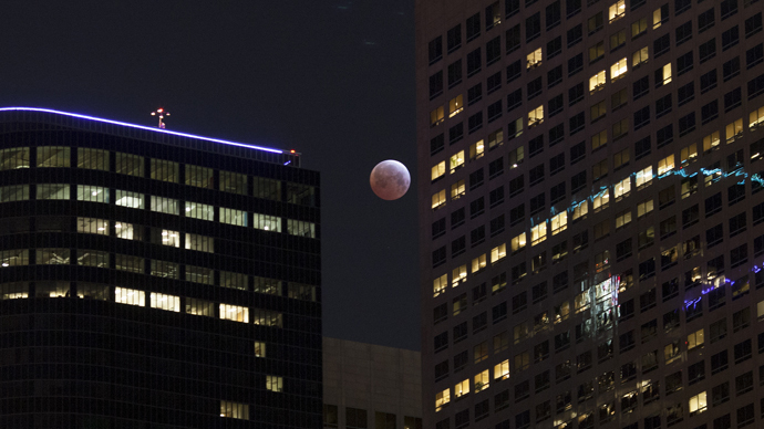 Shortest lunar eclipse of the century delights millions (PHOTOS)