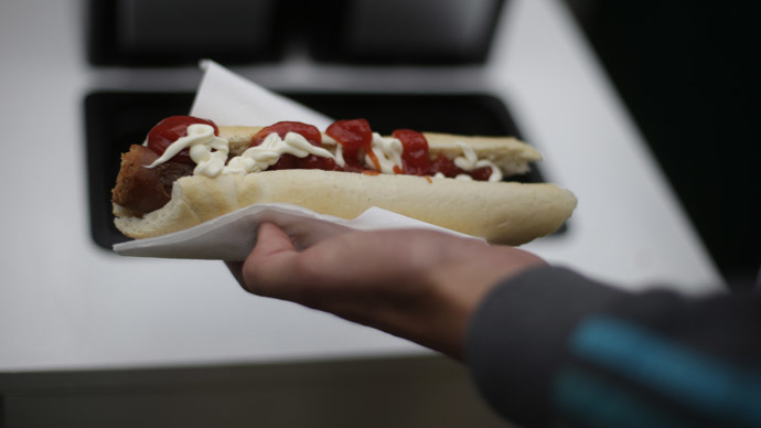 Forked over: Posh-boy Cameron mocked for eating a hot dog with cutlery