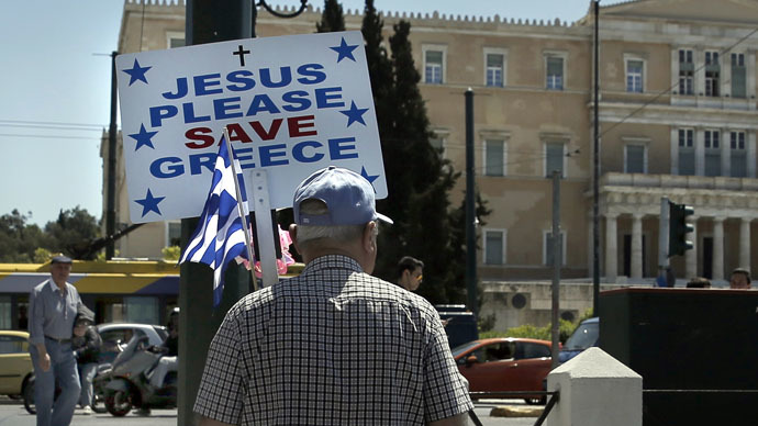 Greek govt pledges to pay off all debt, Varoufakis back in game