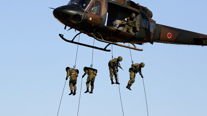 Japan's cabinet approves legislation expanding military powers