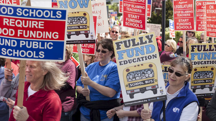 Schools close in Seattle as thousands of teachers wage day-long strike