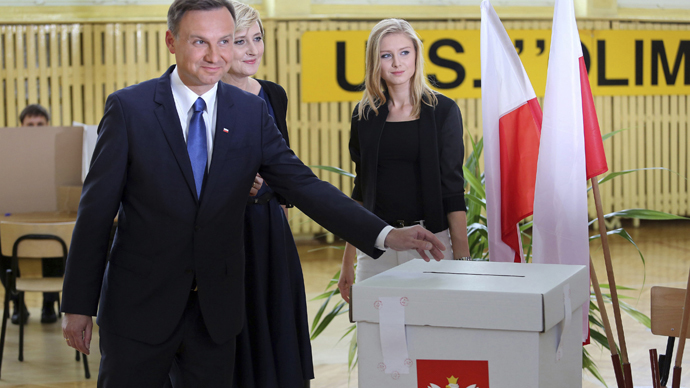 Polish President Komorowski concedes defeat to conservative challenger in runoff election