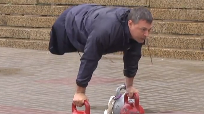 'Strong in spirit': Disabled war veterans pump iron to honor WWII heroes (VIDEO)
