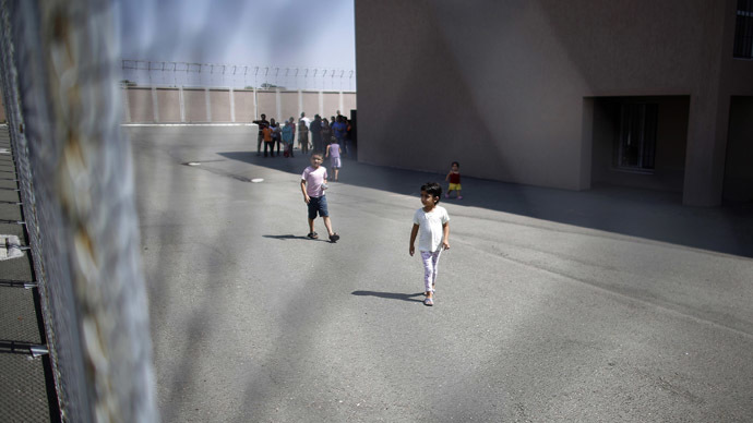 Children fleeing warzones illegally held in adult detention centers, investigation finds