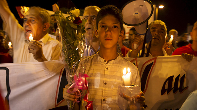 Tunisia holds vigil for horrific beach massacre victims (PHOTOS)