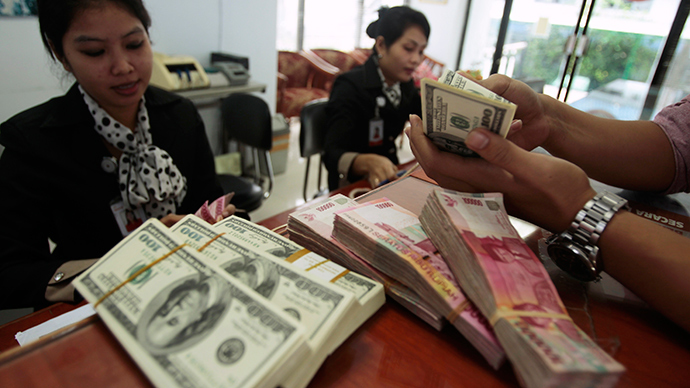 Indonesian ban on foreign currency payments comes into force  Rupiah-dollar