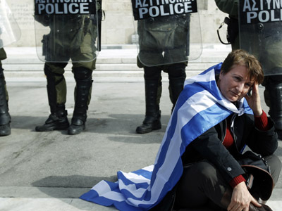 Greek default ghost becoming flesh and blood