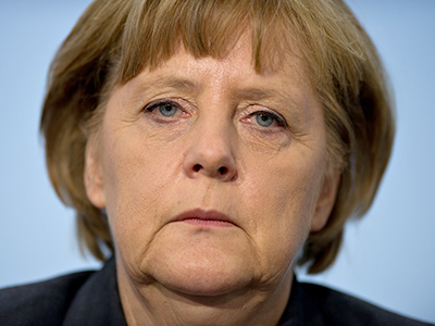 Merkel on defensive amid worries Germany too generous to Spain