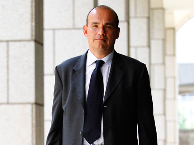 Olympus butters up ex-chief out of court