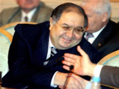 Russian tycoon Usmanov bites bigger piece of Arsenal's cake