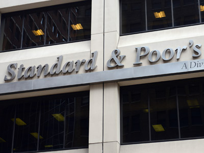S&P downgrades 15 Spanish lenders