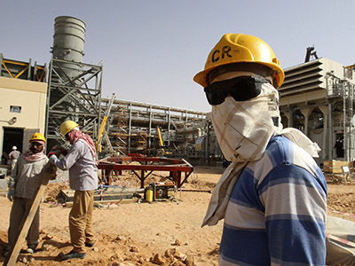 Saudi Arabia boosts output to balance feverish oil market