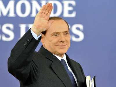 A sea of red as Berlusconi steps down