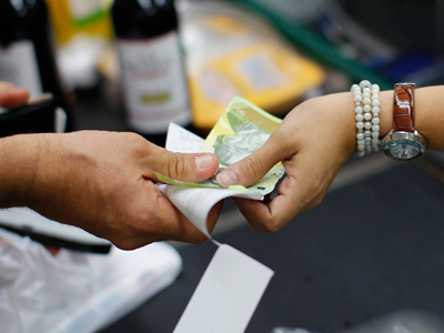Venezuelan currency devalued by a third