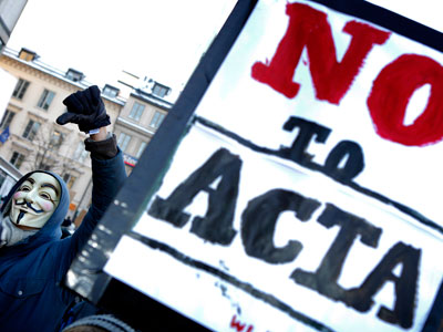 A protester wearing Guy Fawkes mask, takes part in a demonstration in Stockholm.(AFP Photo / Fredrik Persson)