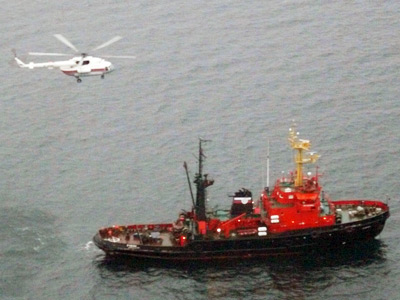 Divers recovery body from sunken gold ship, 8 crew still missing