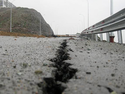 Down the drain in the rain: $1 billion highway washed away in Far East (PHOTOS)