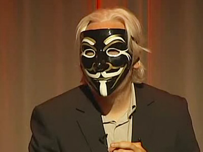 Assange sports Anonymous mask in extradition ruling run-up