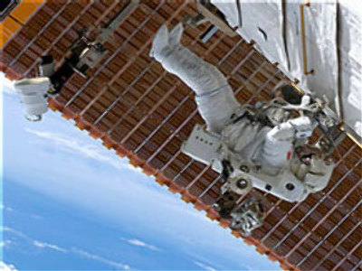 Astronauts’ spacewalk shortened by Hurricane Dean