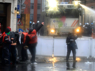 Belgian police fire water cannons to disperse striking ArcelorMittal workers
