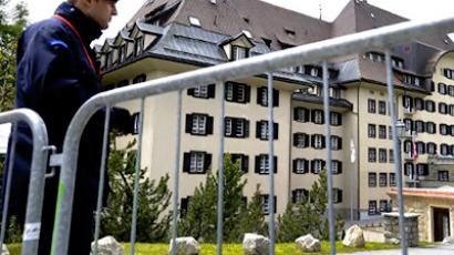 A private policeman guarding the Suvretta House five-star hotel on June 9, 2011 (AFP Photo / Fabrice Coffrini)