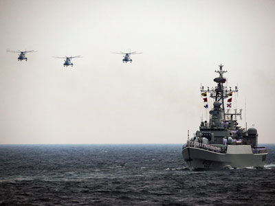 Beijing flexes naval might in western Pacific