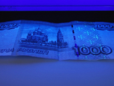 Cop steals marked money from dozing police aide