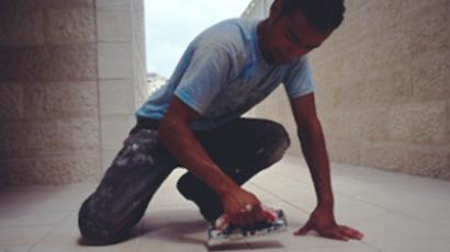 Illegal worker at work, Israel 2008 (Photo by John Perkins)
 