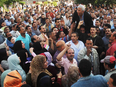 Egyptian protesters demonstrate in the Nile Delta textile town of Mahalla el-Kubra (Reuters / Stringer Egypt)