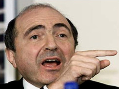 Exiled tycoon charged with plotting coup - lawyer